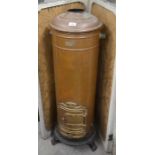 A French copper cylindrical  heater with maker's name plate, Scelliers & Co. Paris 'Le Villabois'