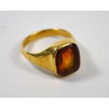 A gold signet ring with cornelian intaglio