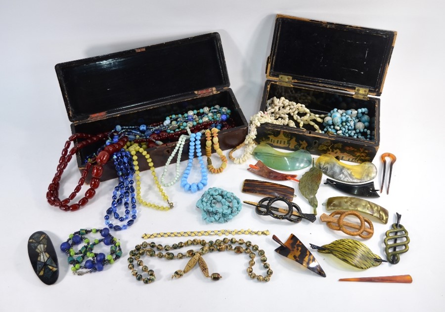 Two Japanned boxes of mixed vintage jewellery