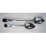 A George III Old English pattern stuffing spoon and table spoon