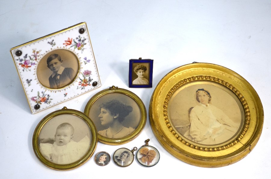 A selection of late Victorian/Edwardian framed family photographs and pendant