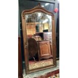 A large 19th century French oak framed mirror
