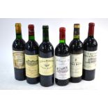 Six various bottles of claret