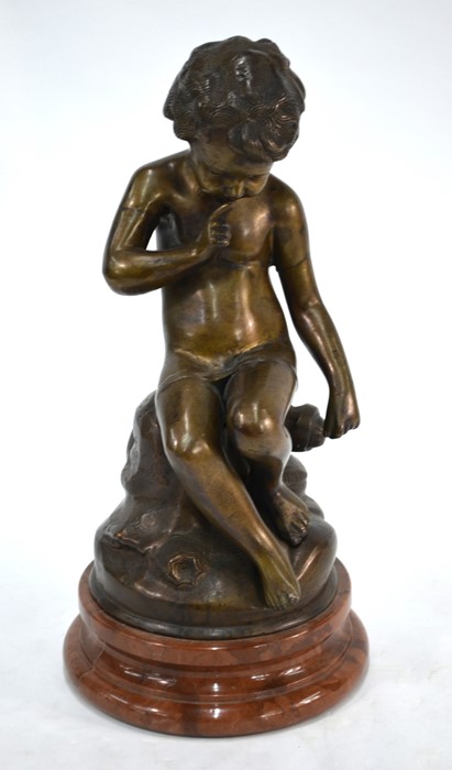 A bronze figure of a contemplative young cherub - Image 3 of 3