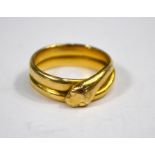An 18ct yellow gold serpent ring