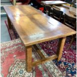 A traditional contemporary oak refectory dining table