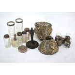Five liquor glasses in pierced silver holders and silver mounted jars and bottles