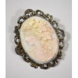 An oval brooch featuring classical maiden
