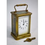 A small brass cased carriage clock