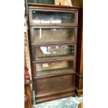 A Globe Wernicke four glazed section oak library bookcase