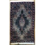 A pair of Persian Senneh small rugs circa 1950's