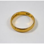 A 22ct yellow gold D-shaped wedding band