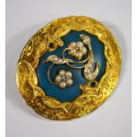 A Victorian oval brooch