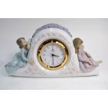 A Lladro 'Two Sisters' mantel clock