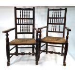 Two 19th century Lancashire oak/elm spindle-back rush seated open armchairs