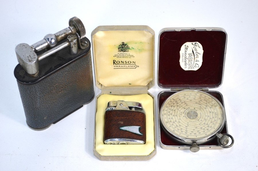 A Fowler & Co, Manchester, Patent Pocket Calculator and two cigarette lighters