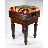 An Edwardian mahogany adjustable piano stool