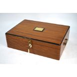 A satinwood box with leather lined interior