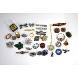 A collection of antique and later brooches