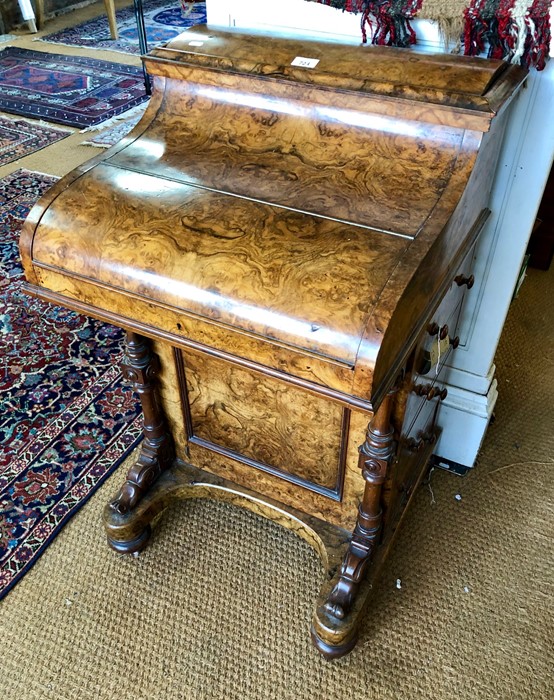 A Victorian bur walnut piano-top Davenport desk