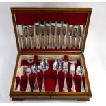 An oak canteen of electroplated flatware and cutlery