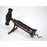 A Victorian steel two-pillar rack-and-pinion corkscrew with turned wood handle