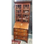 A 19th century mahogany cottage scale bureau bookcase