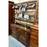 A part 19th century cottage oak high dresser