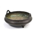 A Chinese bronze censer of circular and tripod form