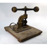 A cast iron correspondence embossing press floral decoration