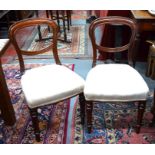 A set of six mahogany Victorian balloon back dining chairs