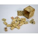 A Napoleonic Prisoner of War work bone miniature cube box, dominoes and dice