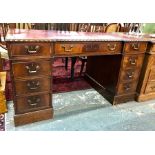 A George III style mahogany twin pedestal desk