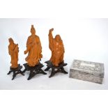 Three Chinese carved sandalwood figures and an Indo-Persian white metal cigarette box