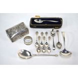 Various silver spoons, napkin ring and a Burmese white metal trinket box