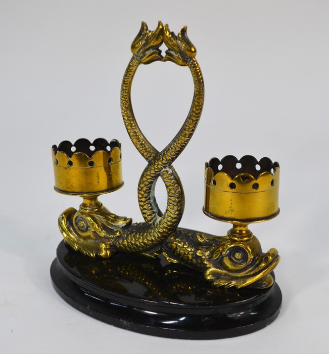 A Regency brass two-sconce candle holder