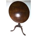 A George III mahogany circular tilt top tripod table