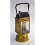 An antique brass carbide hand-lantern