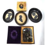 Collection of silhouettes, portrait miniature and leather-cased photograph