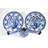 A pair of blue and white Chinese or Japanese dishes and a blue and white ink well