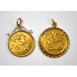 Two half sovereigns in mounts