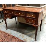 Cooper & Holt, London, a mahogany five drawer desk