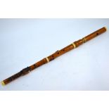 A 19th century boxwood and ivory flute