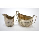 A Victorian silver milk jug and sugar bowl