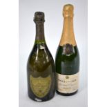A single bottle of 1969 Dom Perignon vintage champagne and a bottle of 1969 Dom Peri