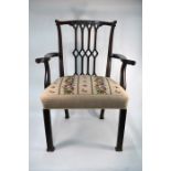 A George III mahogany framed open armchair