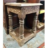 An antique oak stand/table