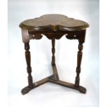 An antique elm cricket table