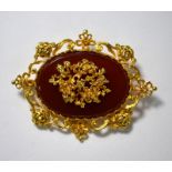 A Victorian style gold brooch