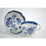 An 18th century Worcester blue and white trembleuse cup and saucer